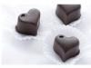Studiu: Ciocolata neagra, beneficiu nou pentru sanatate